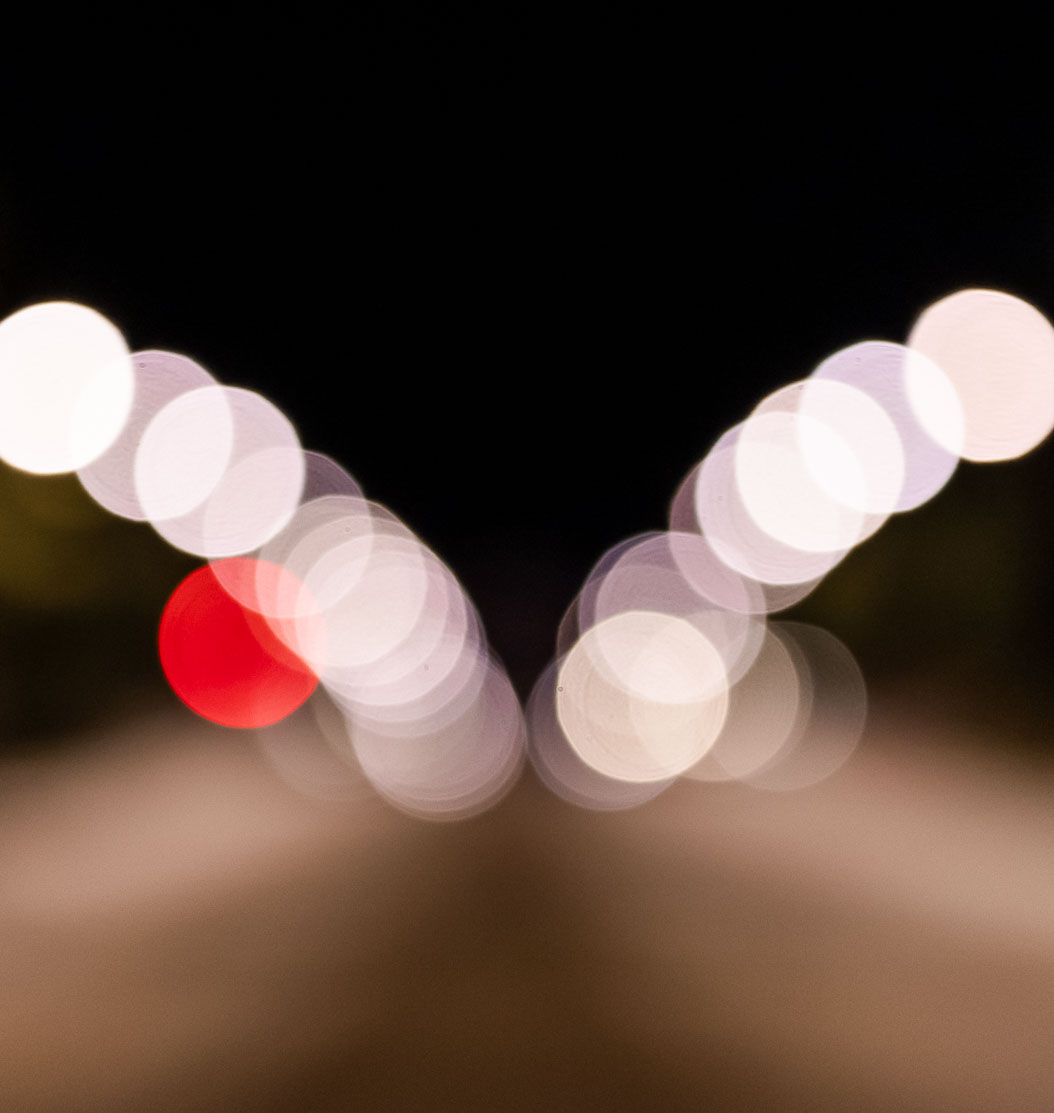 Out of focus picture of a road at night