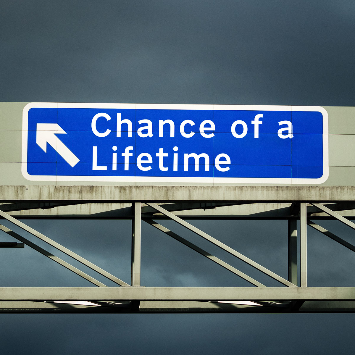 M1 motorway sign saying Chance of a Lifetime exit left